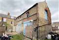 Plans for eyesore plot sold at auction