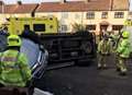 Car flips on its side in five-vehicle pile-up