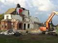 Shock as bulldozers start tearing down pub