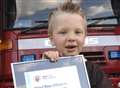 Youngster rewarded for alerting neighbour to fire