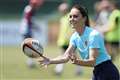Kate shows off sporting skills in game of walking rugby
