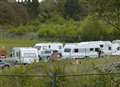 Travellers move in to quiet village