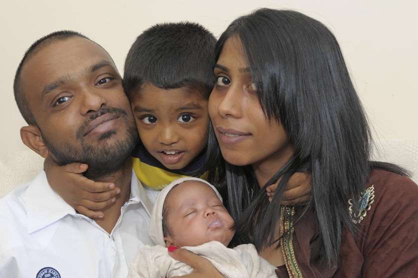 Dad Mohammed Abul Hussain, Mohammed Yameen Hussain, three, and Yeasmin Khanom with baby Mohammed Yaseen Hussain