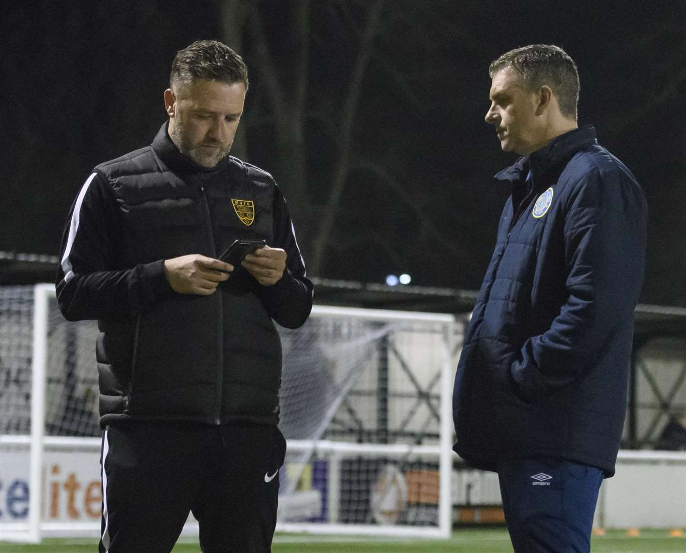 Jay Saunders with former Macclesfield boss John Askey last season Picture: Andy Payton