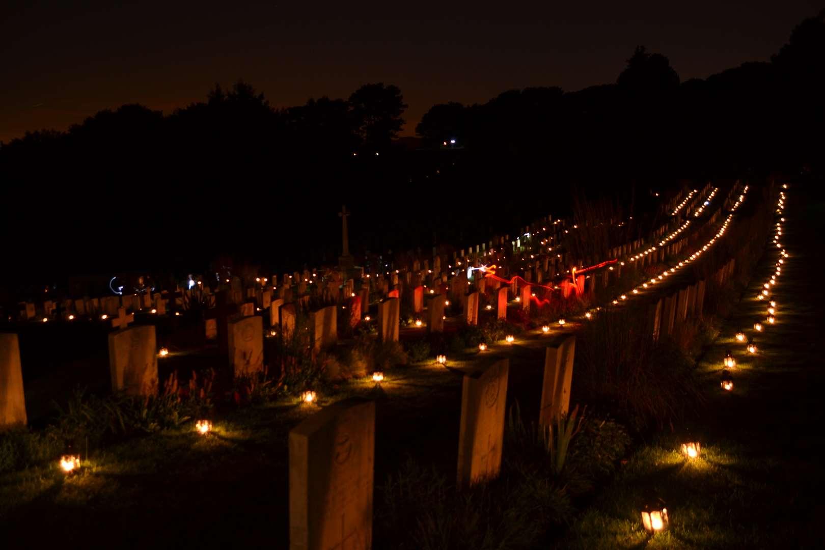 Hundreds of lanterns placed on the graves of the fallen at Shorncliff Military Cemetery