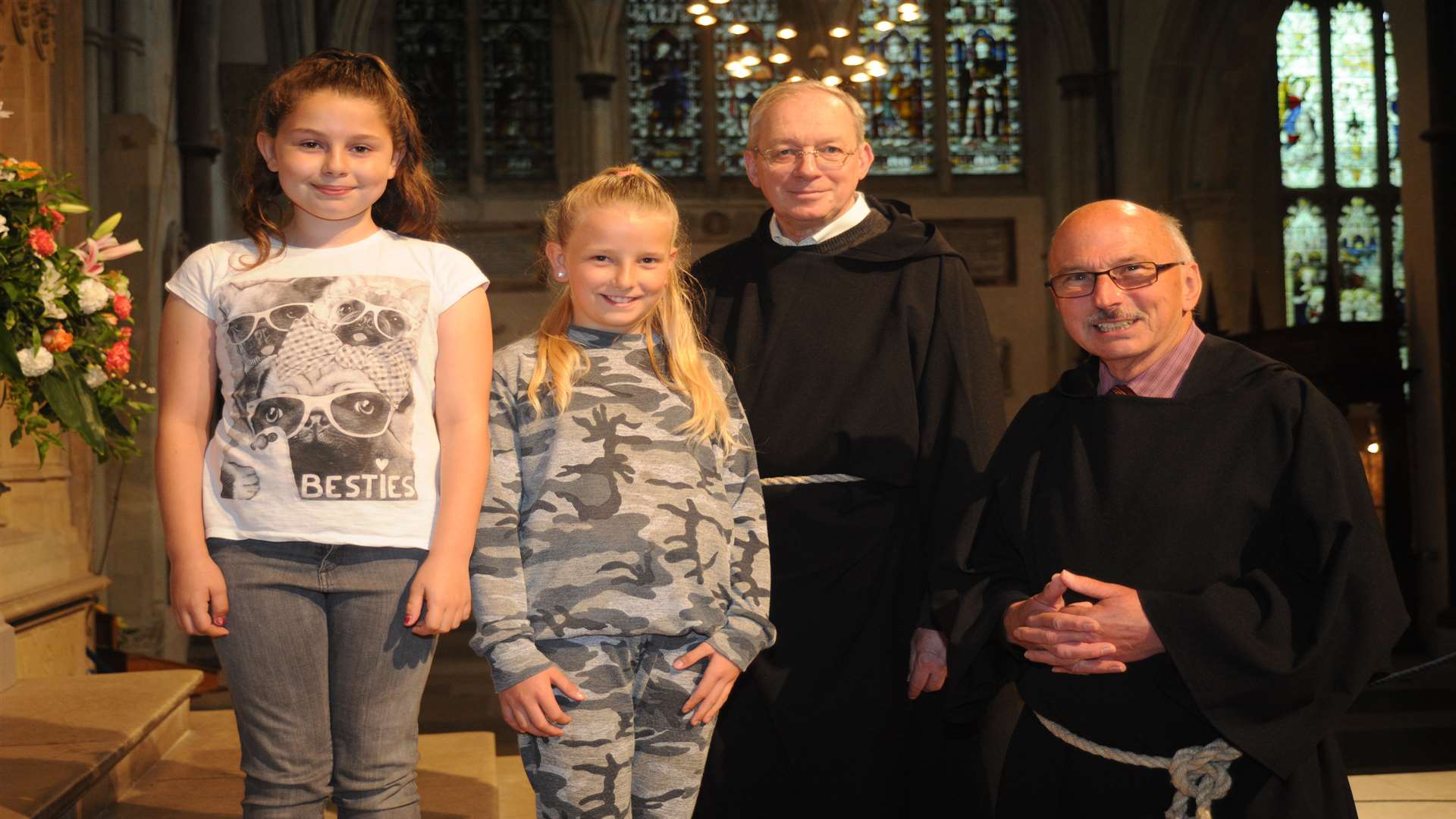 Cathedral volunteers Poppy Gillespie and Keira Popay, both 10, with Martin Dodsworth and Terry Wood