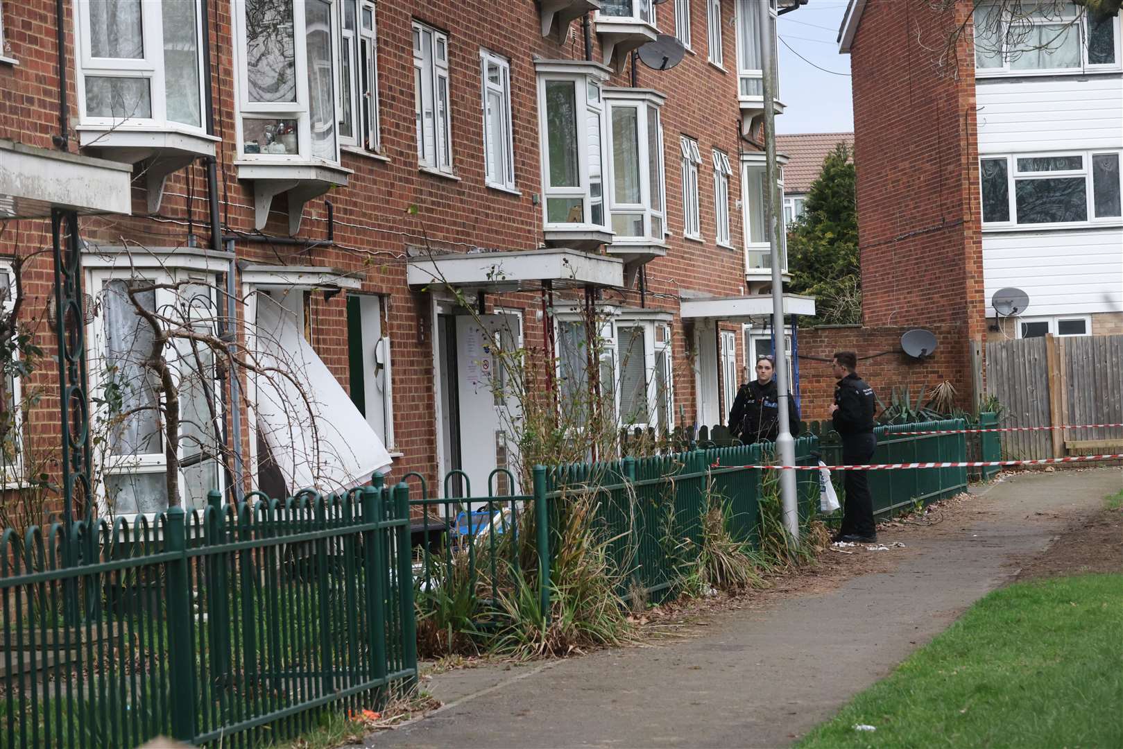 A police cordon remains in place around a block of flats in Catlyn Close, East Malling. Photo: UKNIP
