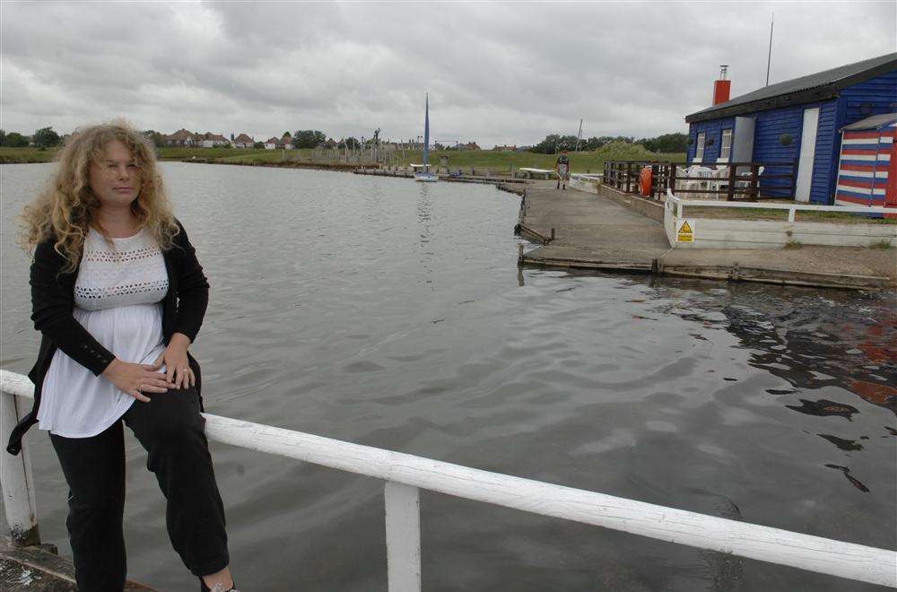 Vicki Carden at Barton's Point Coastal Park where dead fish have been found in the lake