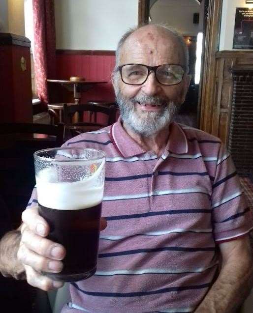 Robert Beaton enjoying a pint at Dartford Working Mens club. Photo credit: Stuart Beaton