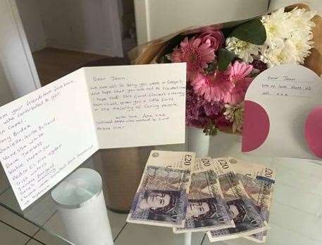 Jean was presented with flowers, a card, and £80