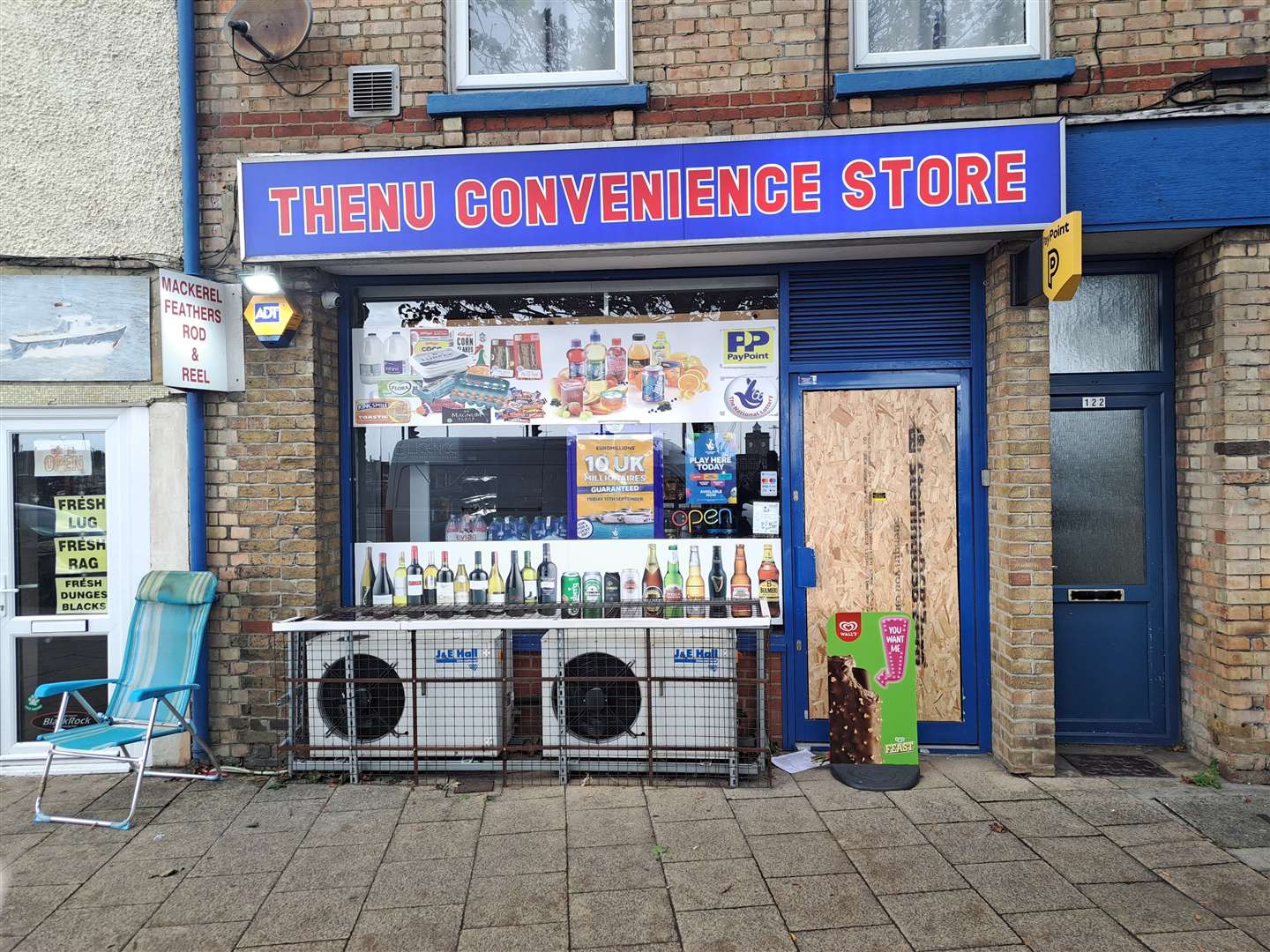 The door to Thenu Convenience Store in Snargate Street, Dover, was boarded up following the incident