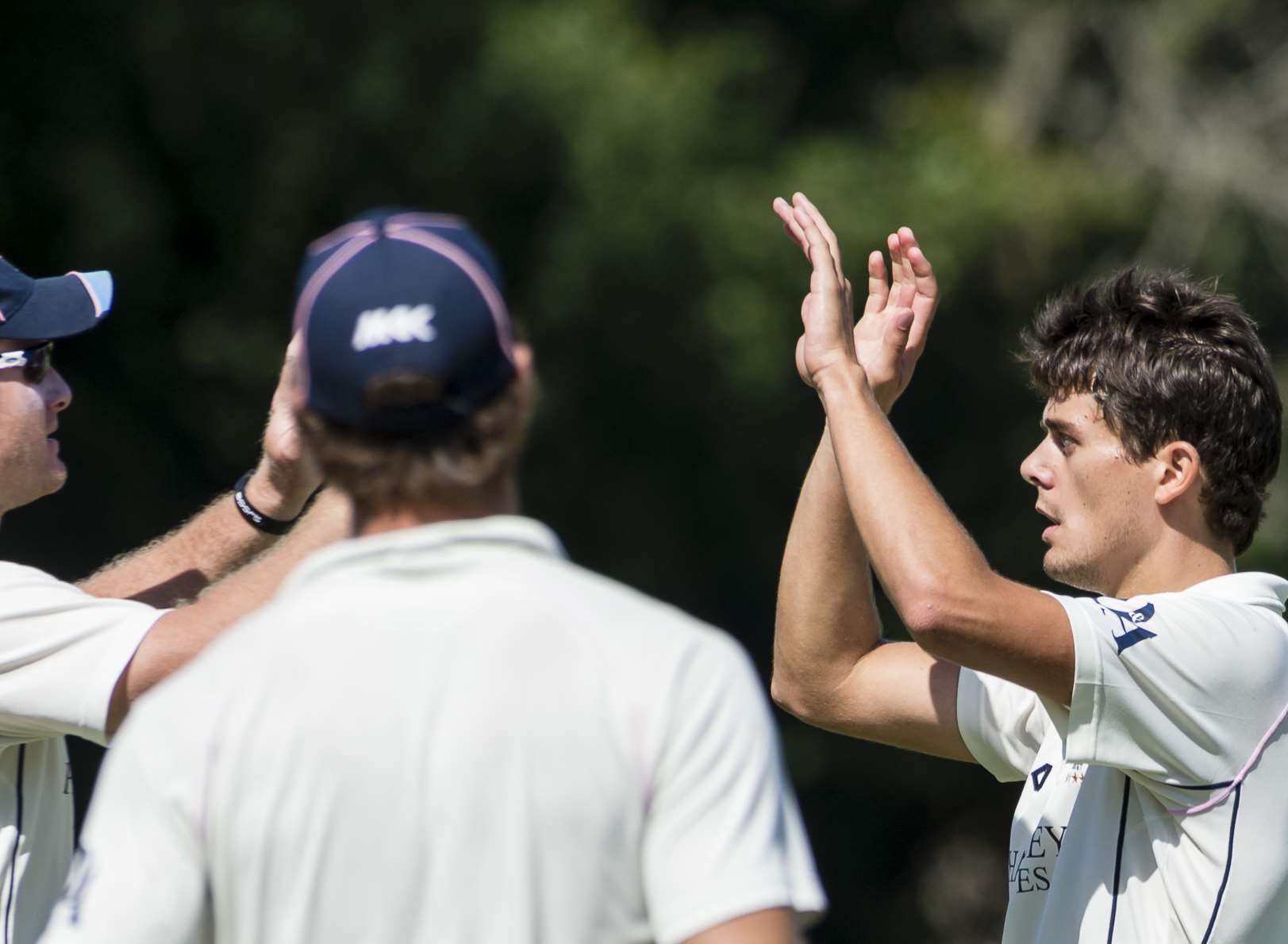 Sam Weller, right, celebrates taking a wicket for Hartley against Tunbridge Wells on Saturday Picture: Andy Payton