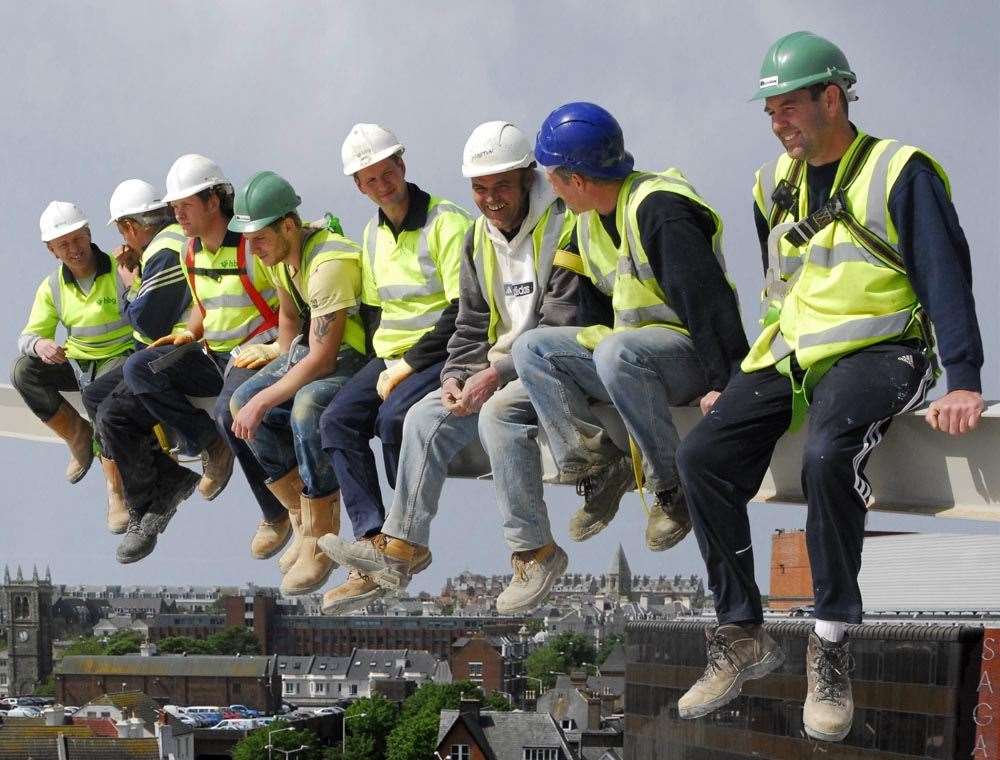 Builders at Bouverie Place recreating the famous 'Lunch atop a Skyscraper'. Pic: Sonia McDuff