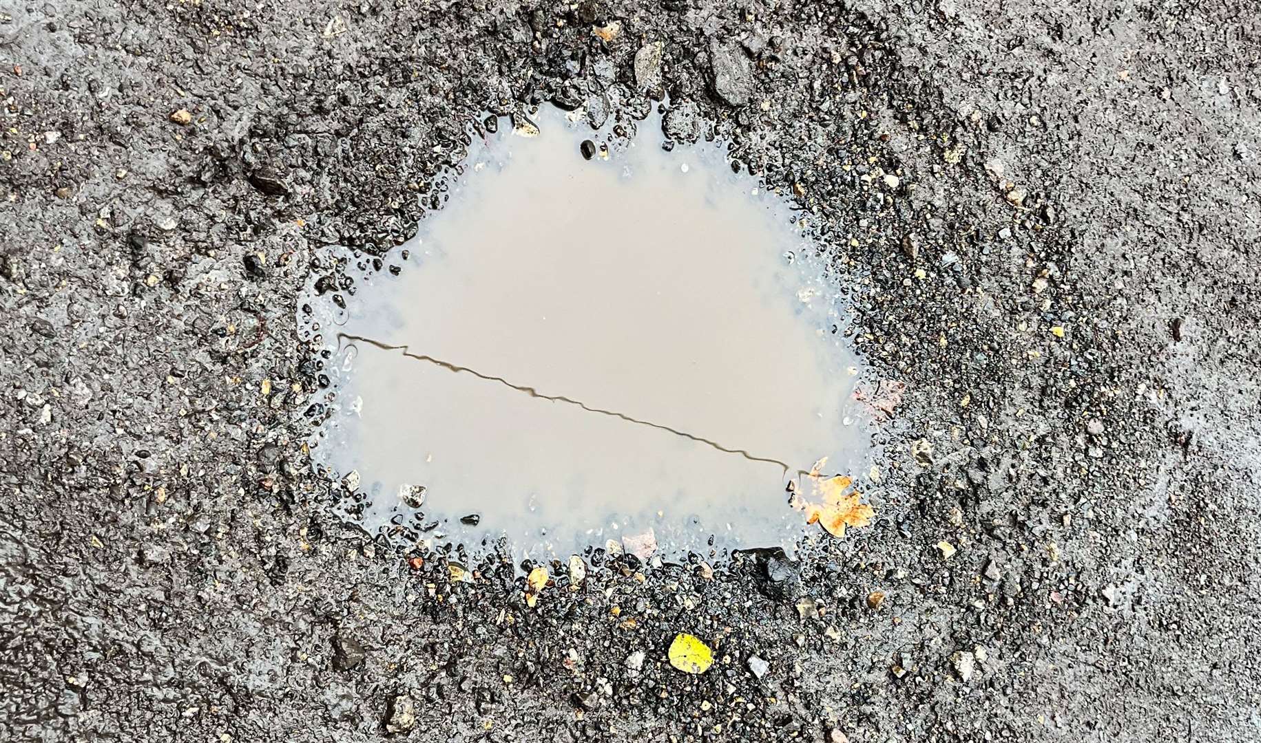 There are said to be around 100 potholes in Bockhanger Lane in Ashford
