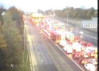 Massive queues are forming on the approach to the Dartford Crossing after a broken down lorry closed two lanes and then a car and lorry collided in the traffic. Picture: National Highways