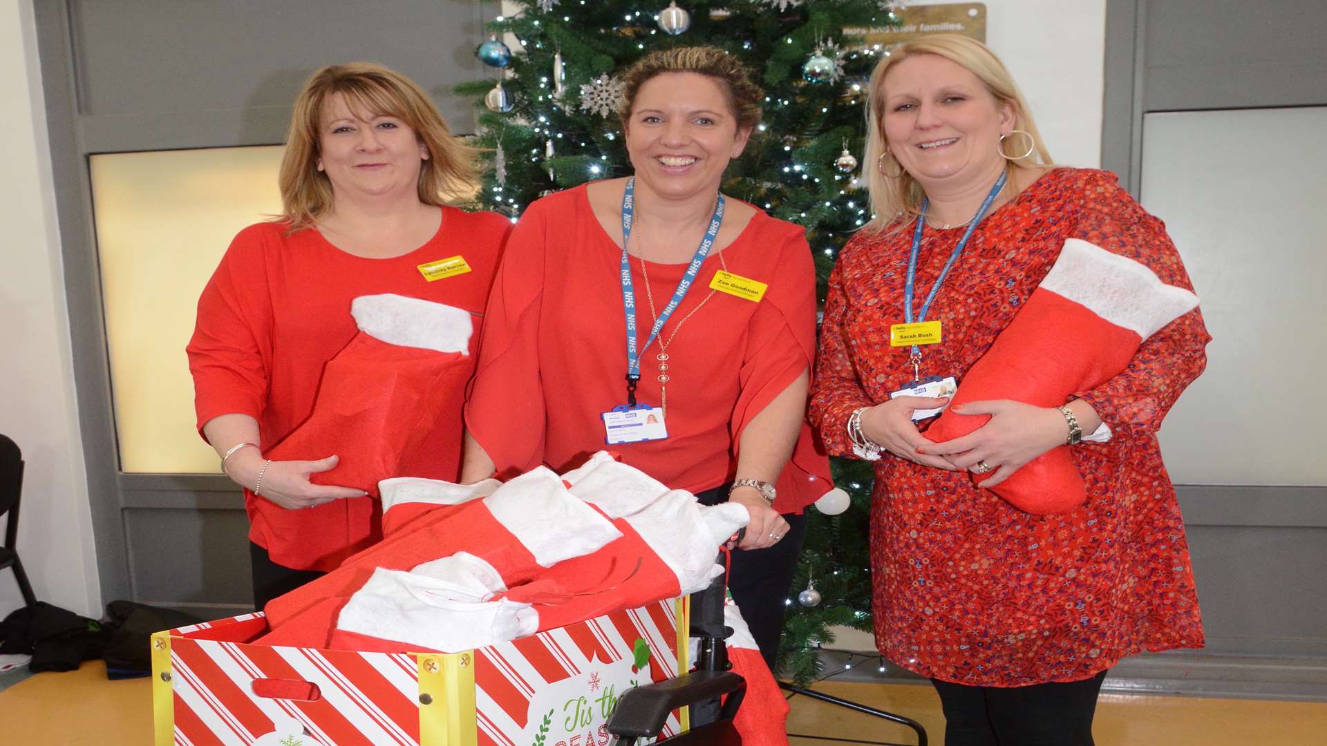 Zoe Goodman, Lyndsay Barrow and Sarah Bush from the Patient experience team delivering gifts to the wards.Picture: Gary Browne