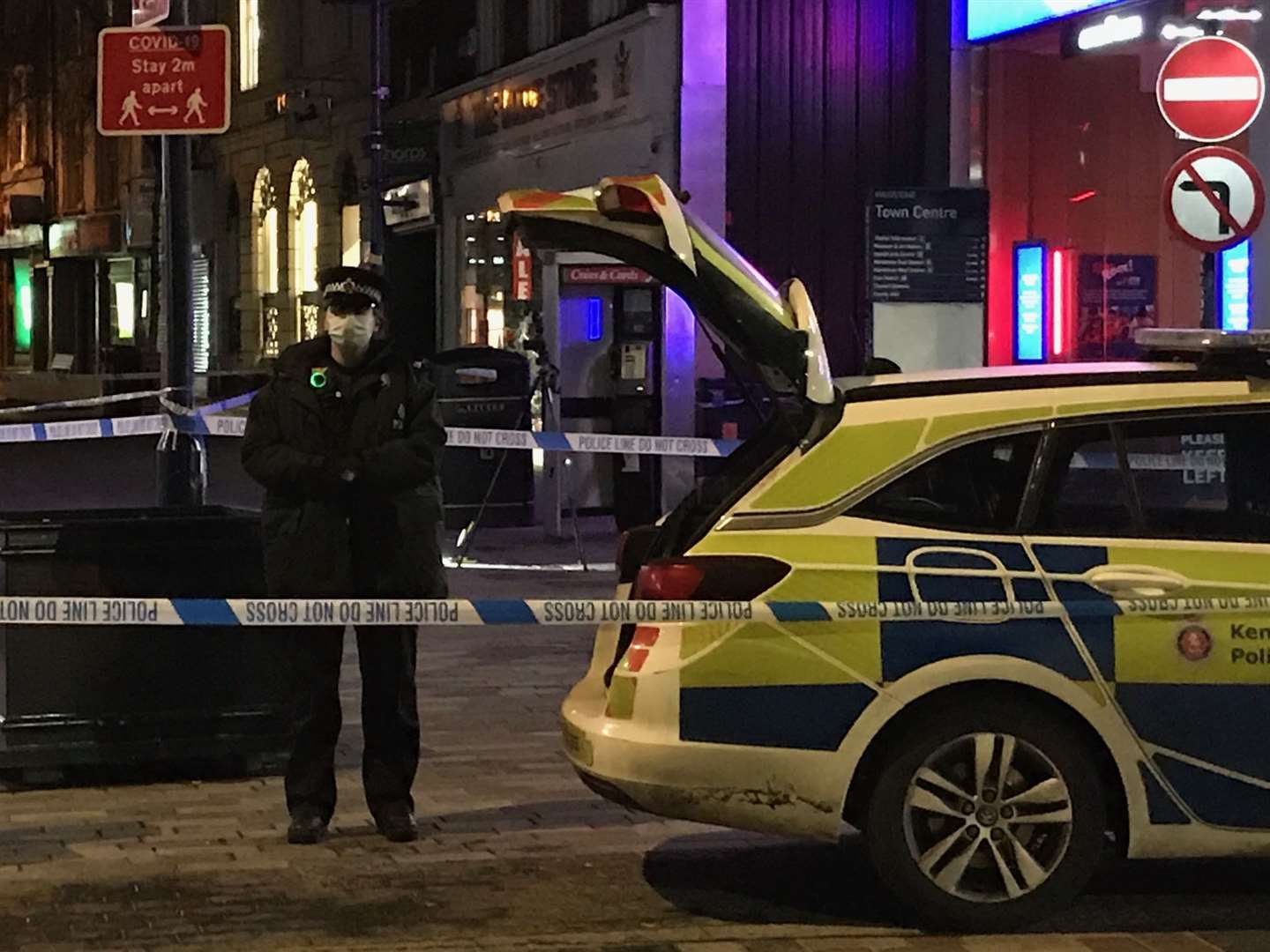 Police cordoned off the High Street end of Week Street after a man was stabbed