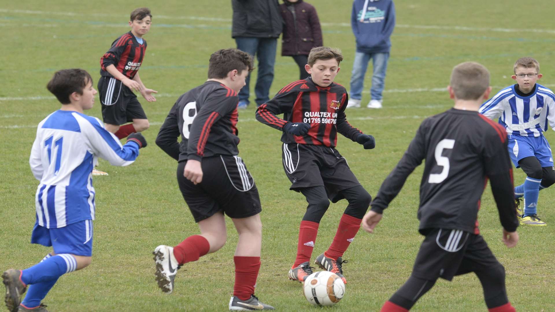 Woodcoombe Youth under-13s (black and red) up against Oak Athletic in Division 1 Picture: Chris Davey