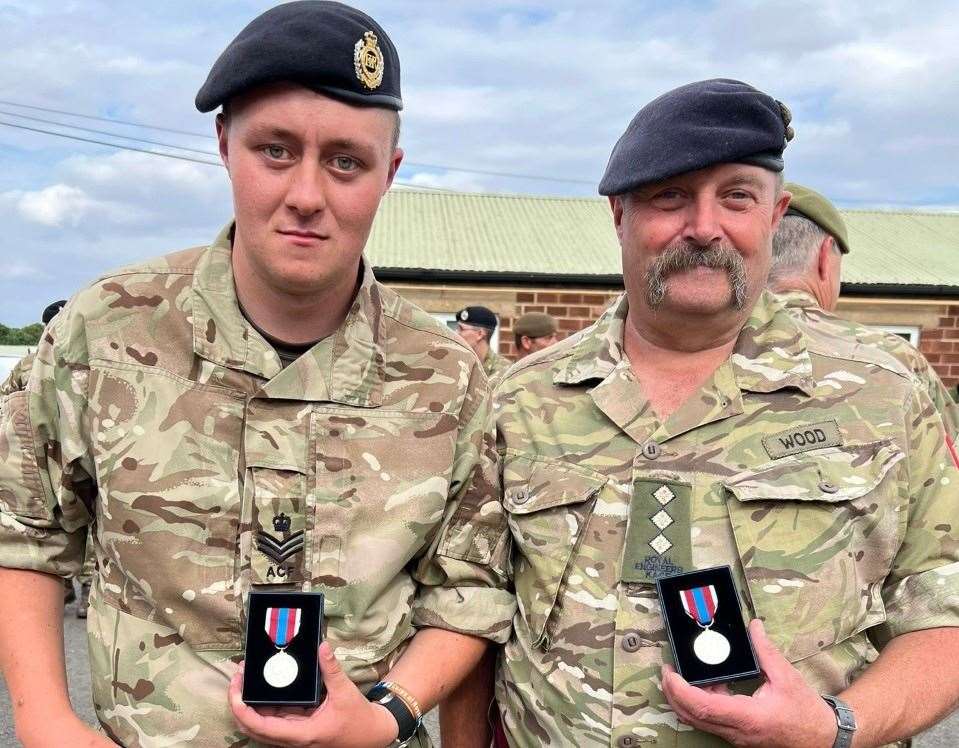 Rob Wood and his son SI Josh Wood with their Queen's Platinum Jubilee Medals