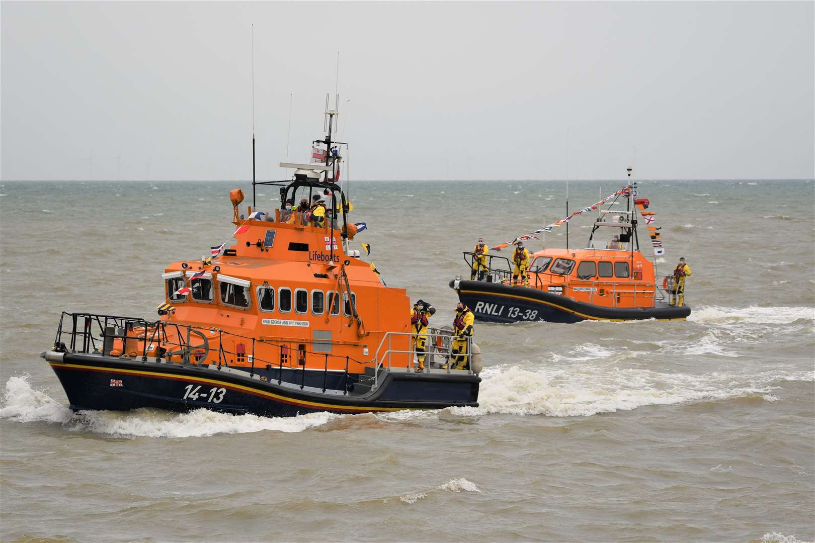 Old and new Sheerness lifeboats - the George and Ivy Swanson, left, and the smaller Judith Copping Joyce off Minster, Sheppey. Picture: RNLI Vic Booth