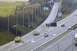 A lorry has overturned on the M20 near Hythe