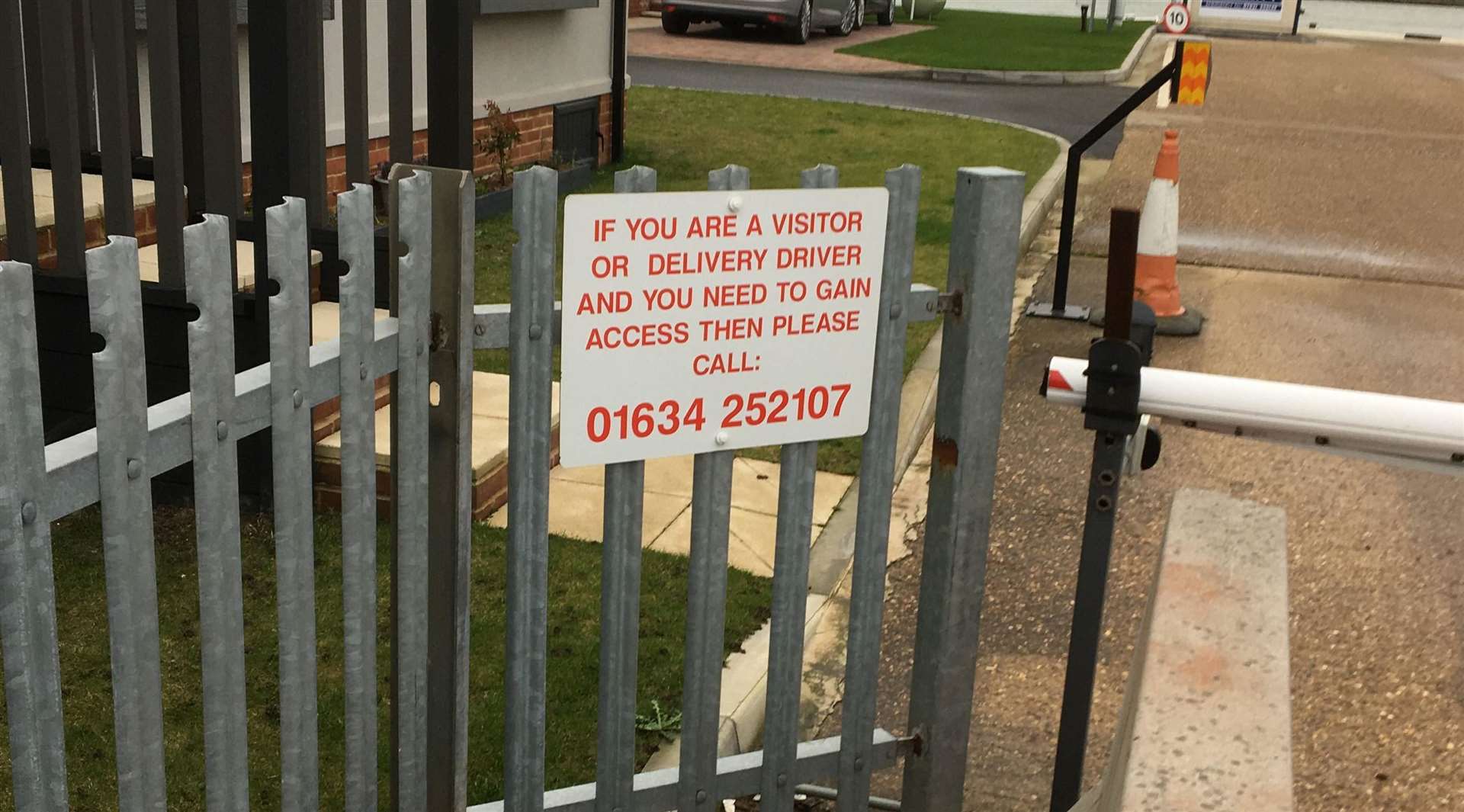 The previous sign when the gate would be opened by the office. Picture: Kim Brierly