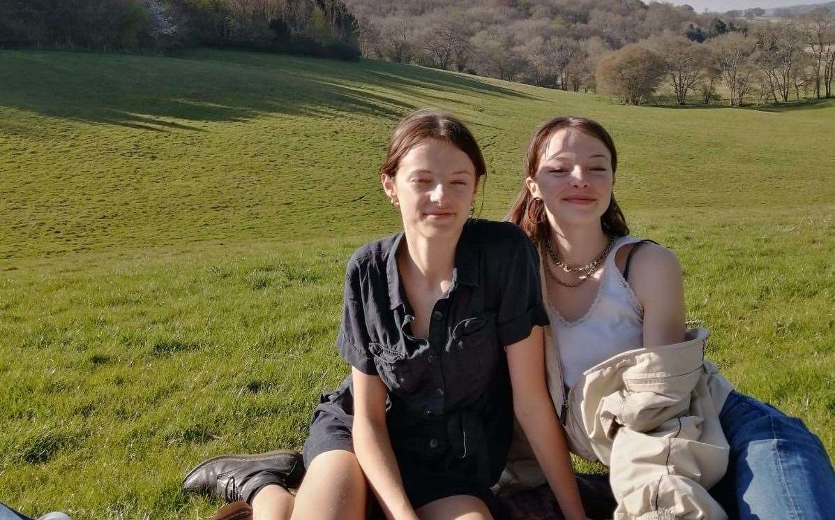 Grace (left) and Cassady enjoying a picnic