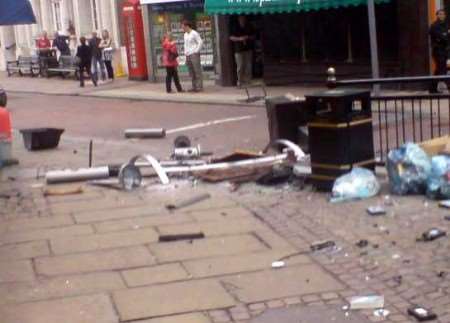Some of the debris smashed on the pavement