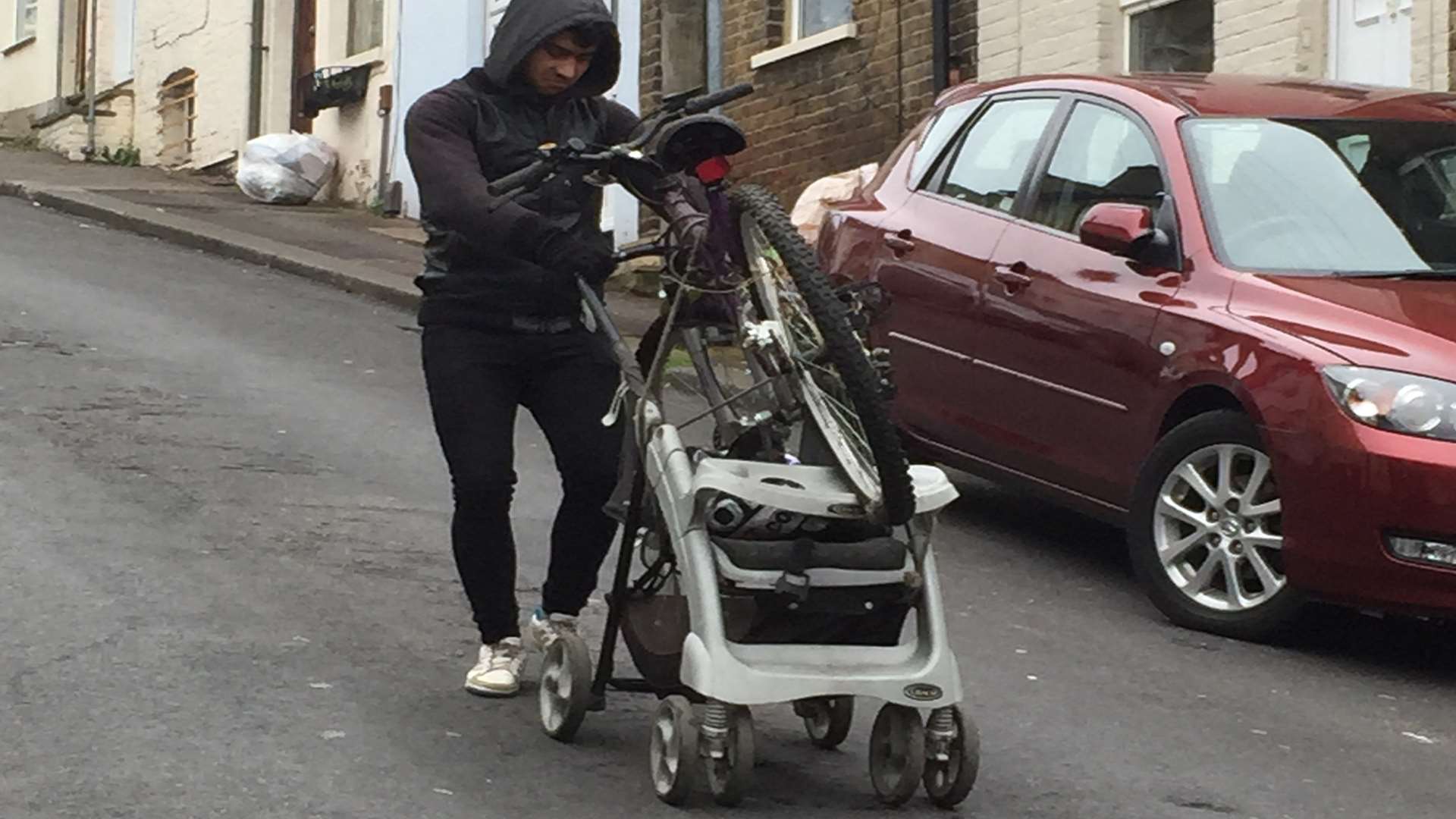 Residents took this photo of another man with a bike on a pushchair in Chatham at the start of April.