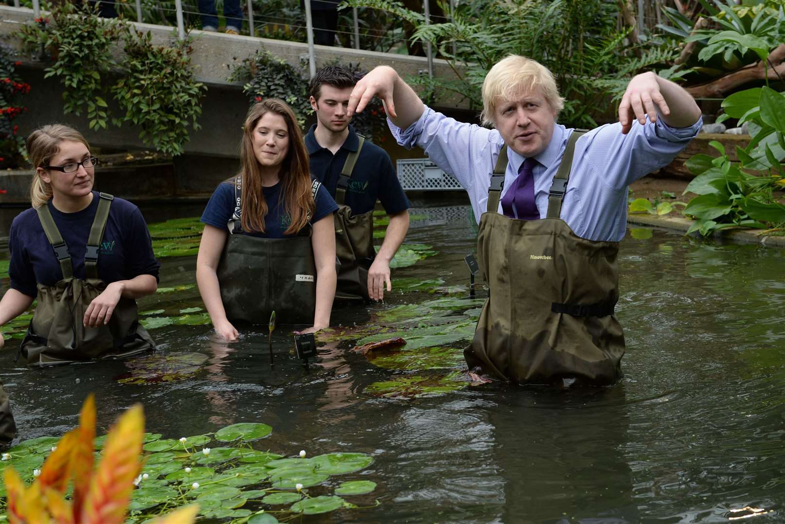 Donning a pair of fishing waders to help plant flowers at the Royal Botanical Gardens at Kew (Stefan Rousseau/PA)