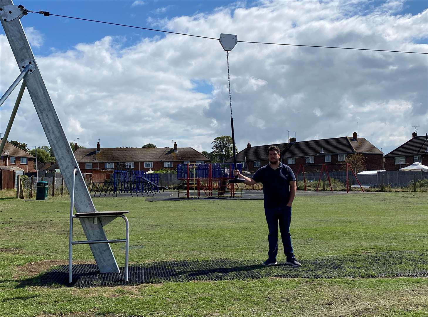 Cllr Elliott Jayes with the new zip wire at New Road playground in Minster