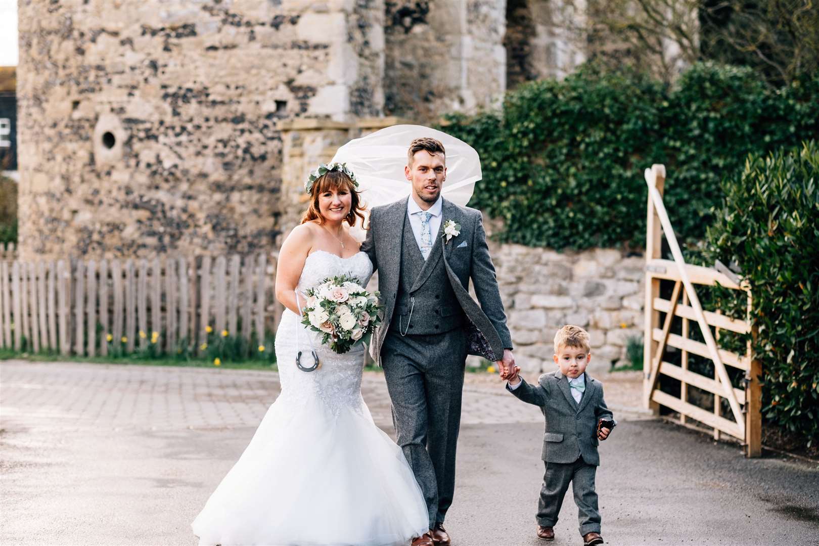 Scott and Adele Richards on their wedding day with son Oscar. Picture: James Eldridge Photography/SWNS