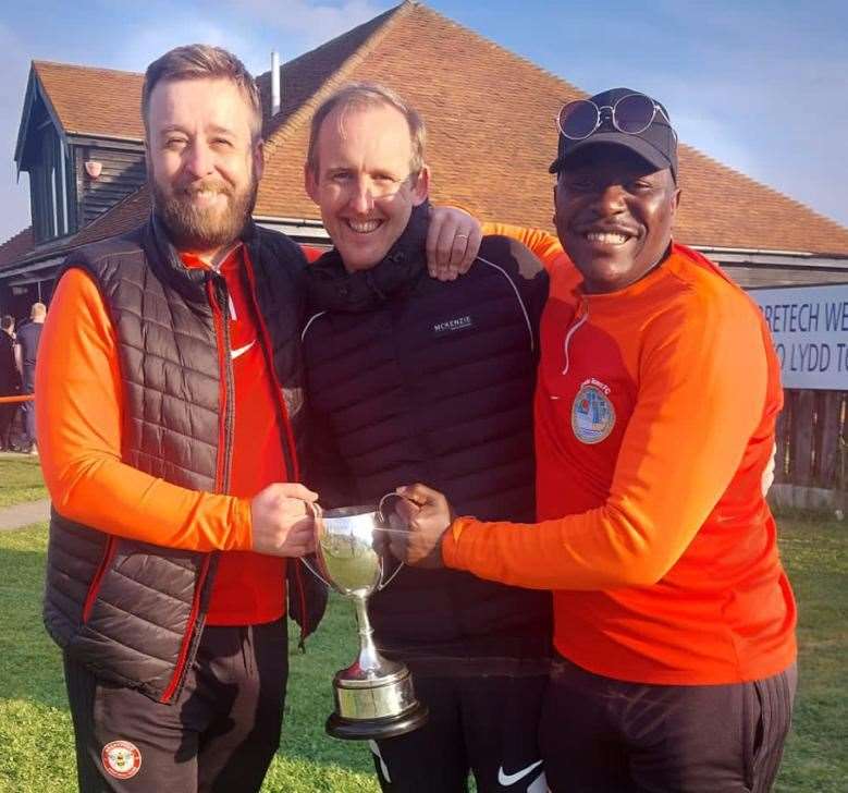 Lydd manager Mickey Doyle, centre, with assistant boss Owen Kessack, left, and Dexter Gondongwe, right.