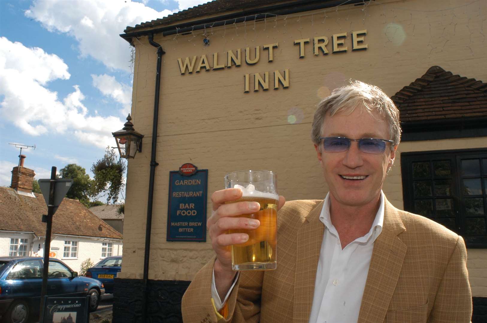 The TV star outside Aldington's Walnut Tree in June 2004