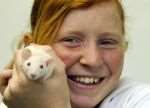 Volunteer Vonny Glass and baby rat Bob - will his picture be a winner?