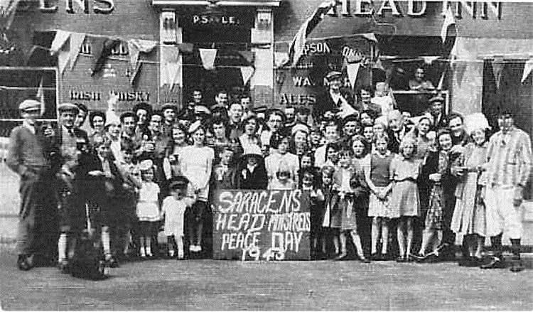Punters celebrate the end of the Second World War in 1945 outside the Saracens Head in Deal. Picture supplied by Paul Skelton/dover-kent.com