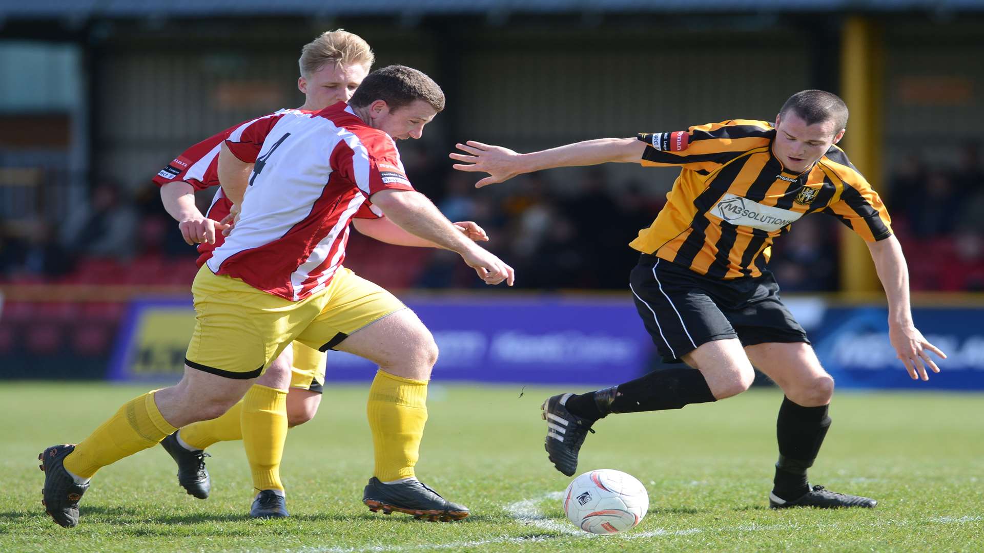 Folkestone's Richard Atkins tries to get in behind the Redhill defence. Picture: Gary Browne