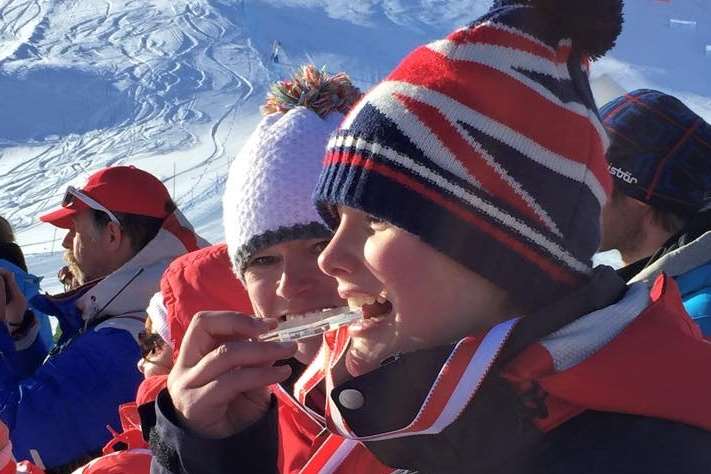 Millie Knight celebrates her first gold medal in St Moritz. Picture: Disability Snowsport UK