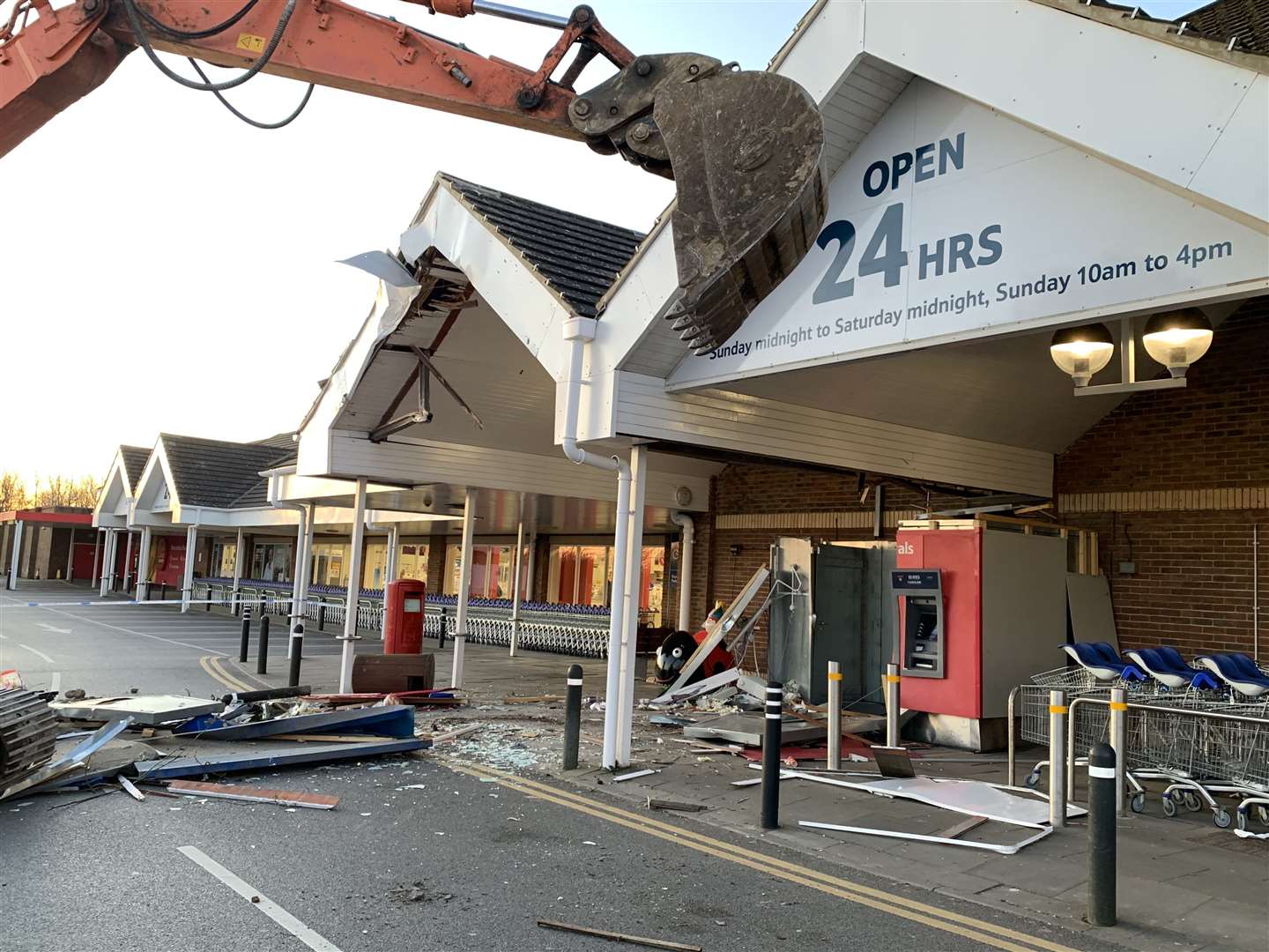 A digger was left at the scene at the Tesco store in March 2020 and the store suffered substantial damage. Picture: Brian Brown