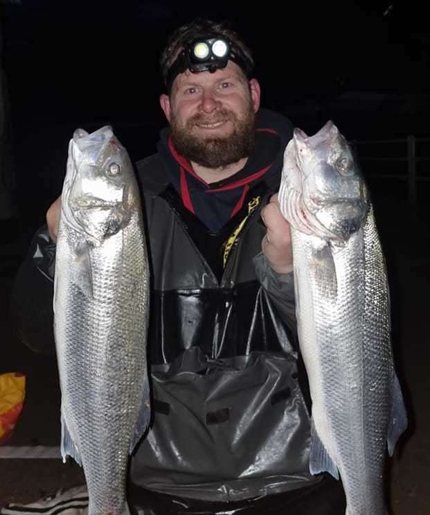 Herne bay angler Neil Creed with a brace of bass