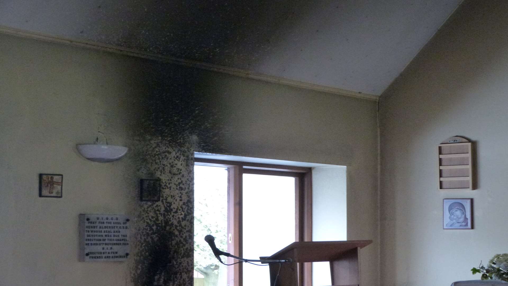 The wall was damaged by the smoke