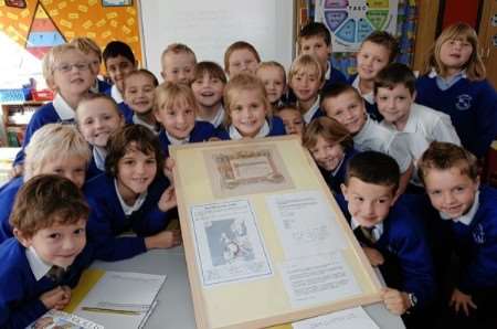 Pupils with the 1917 attendance certificate found in Spain. Picture: John Wardley