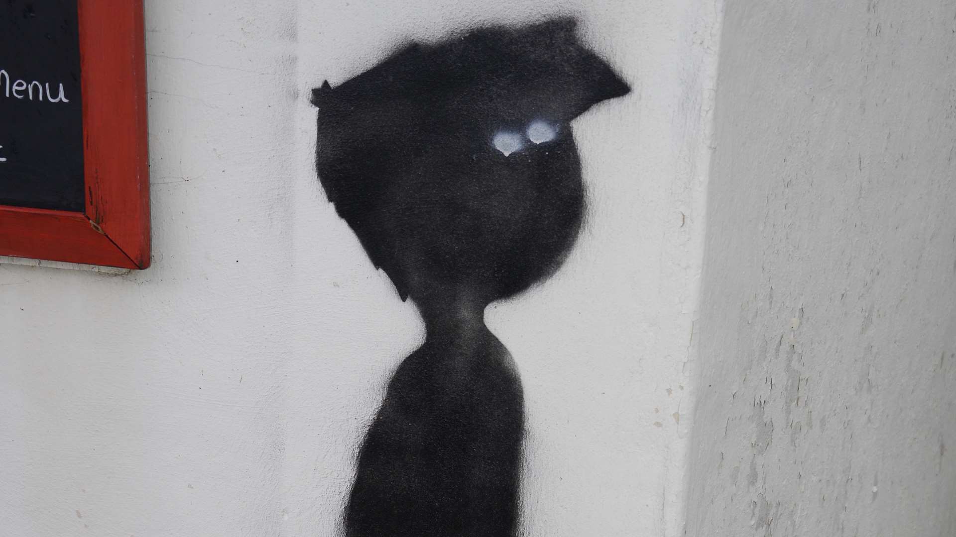 The stencil image of a boy found at Greatstone - is it a Banksy?