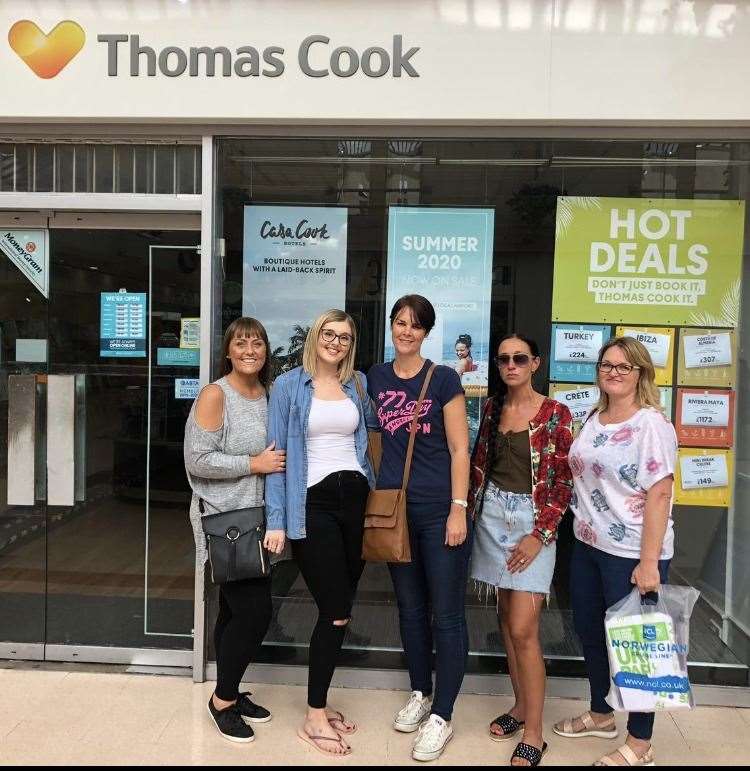 Former Thomas Cook employees, Jeanette Abbey, Kirstie Hayward, Rae Pittman, Jade Beckwith and Lucy Chamberlain return to work after Hays Travel confirmed it was taking over branches