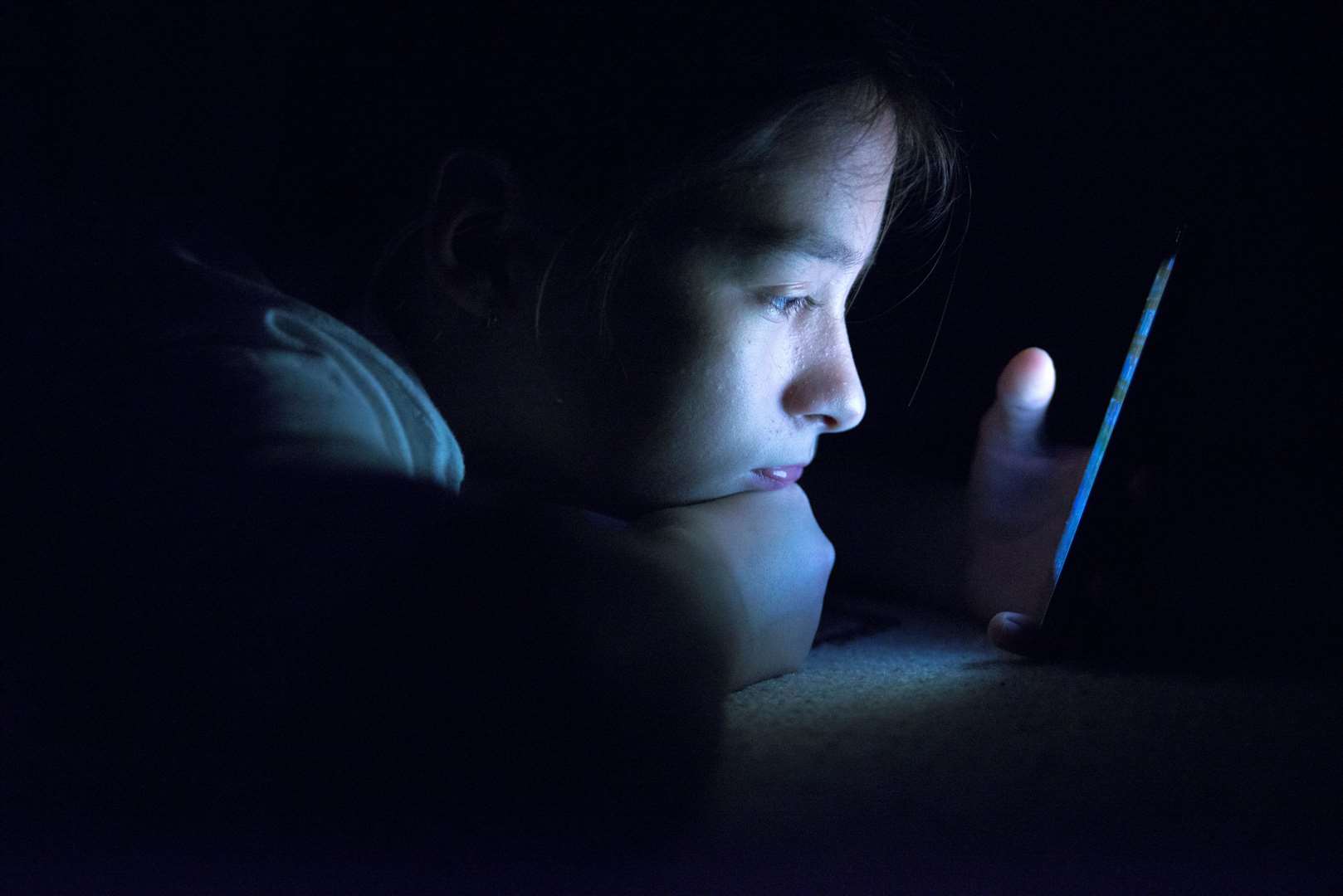 Kept amused by devices and the internet, growing numbers of teens are staying in. Image: iStock.