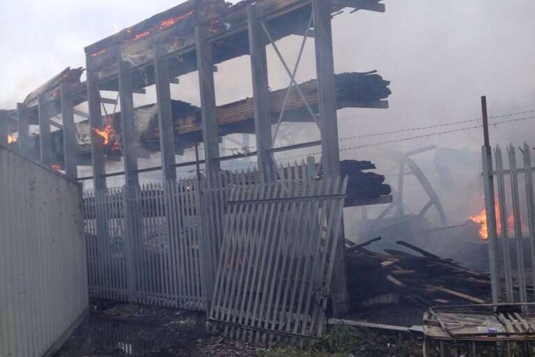 The fire was still burning in part of the Northfleet yard this morning. Picture: @Busa_Bloodbike