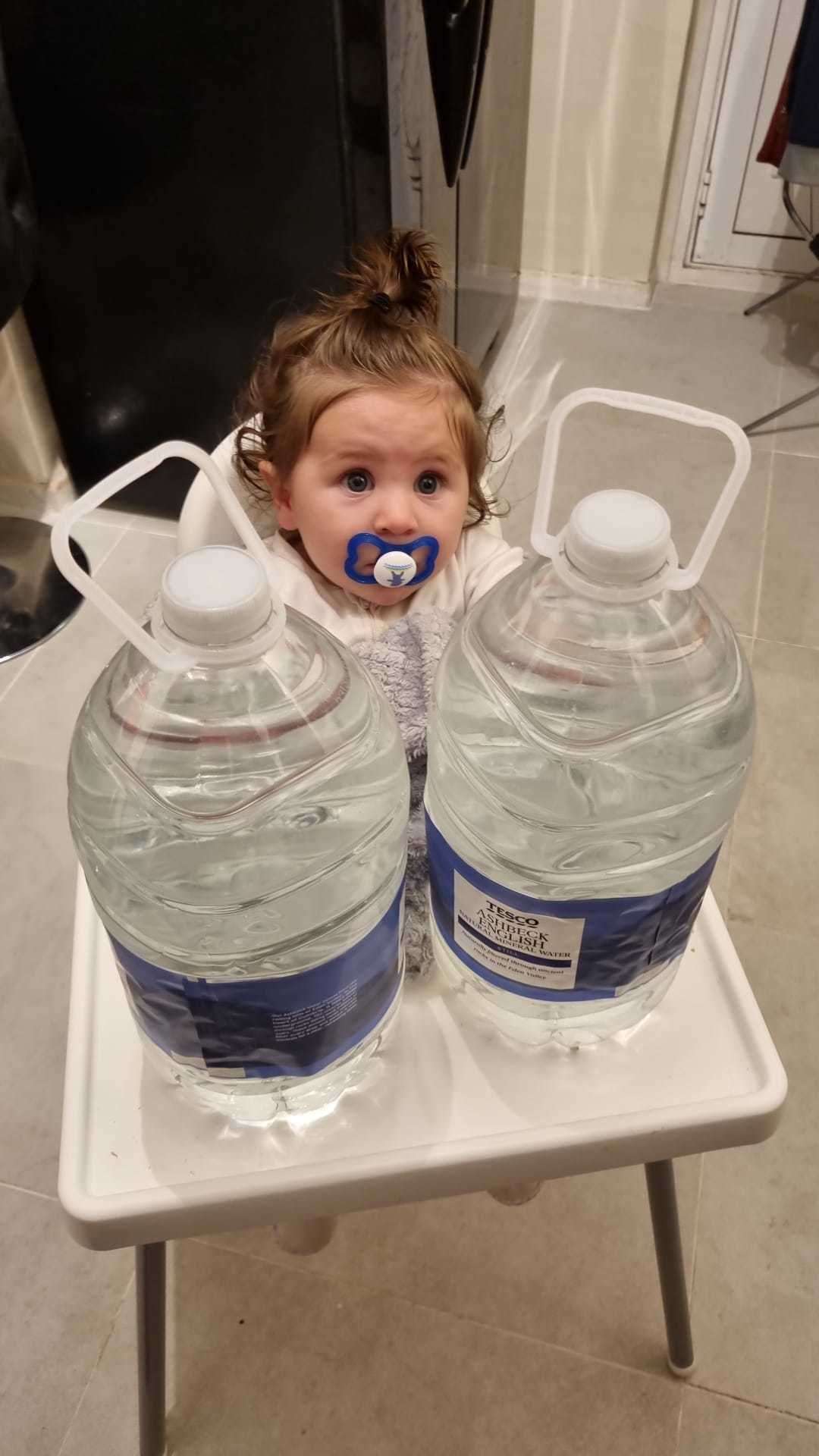 The family had to rush to supermarkets to get water to be able to look after baby Oliver. Picture: Grace Ockwell