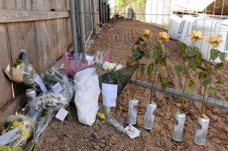 Floral tributes at the scene of the building site accident in Bridgefield Road, Swalecliffe