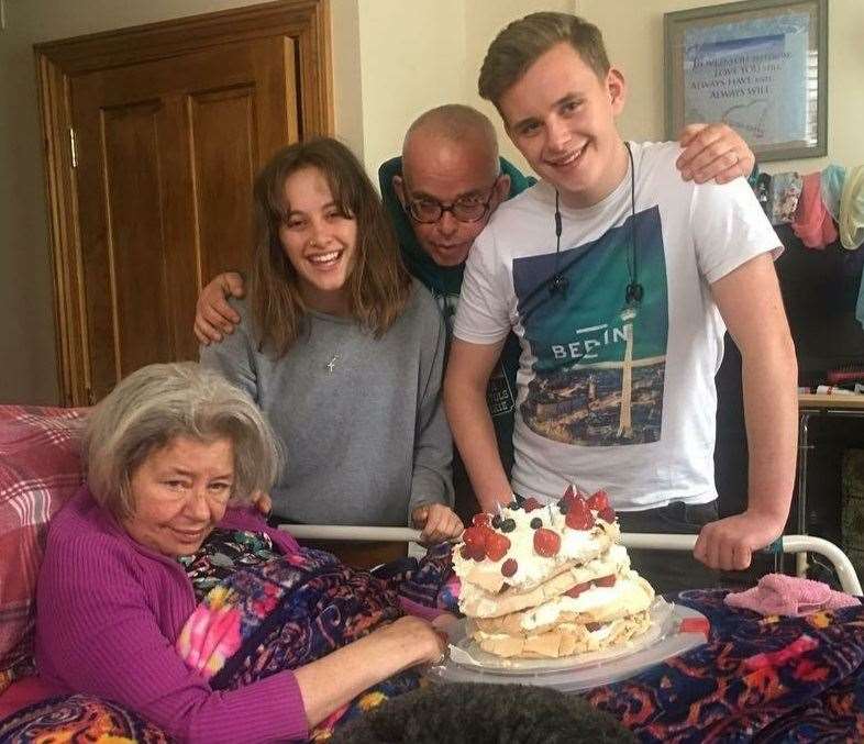 Jeremy, sister Jess, mum Clare and dad Giles celebrate one of Clare's birthday at their Sutherland Road home