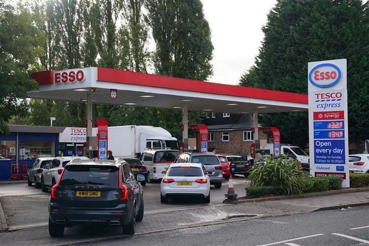 Long queues have continued at petrol stations, despite reports the situation is easing. Picture: Jacob King/PA
